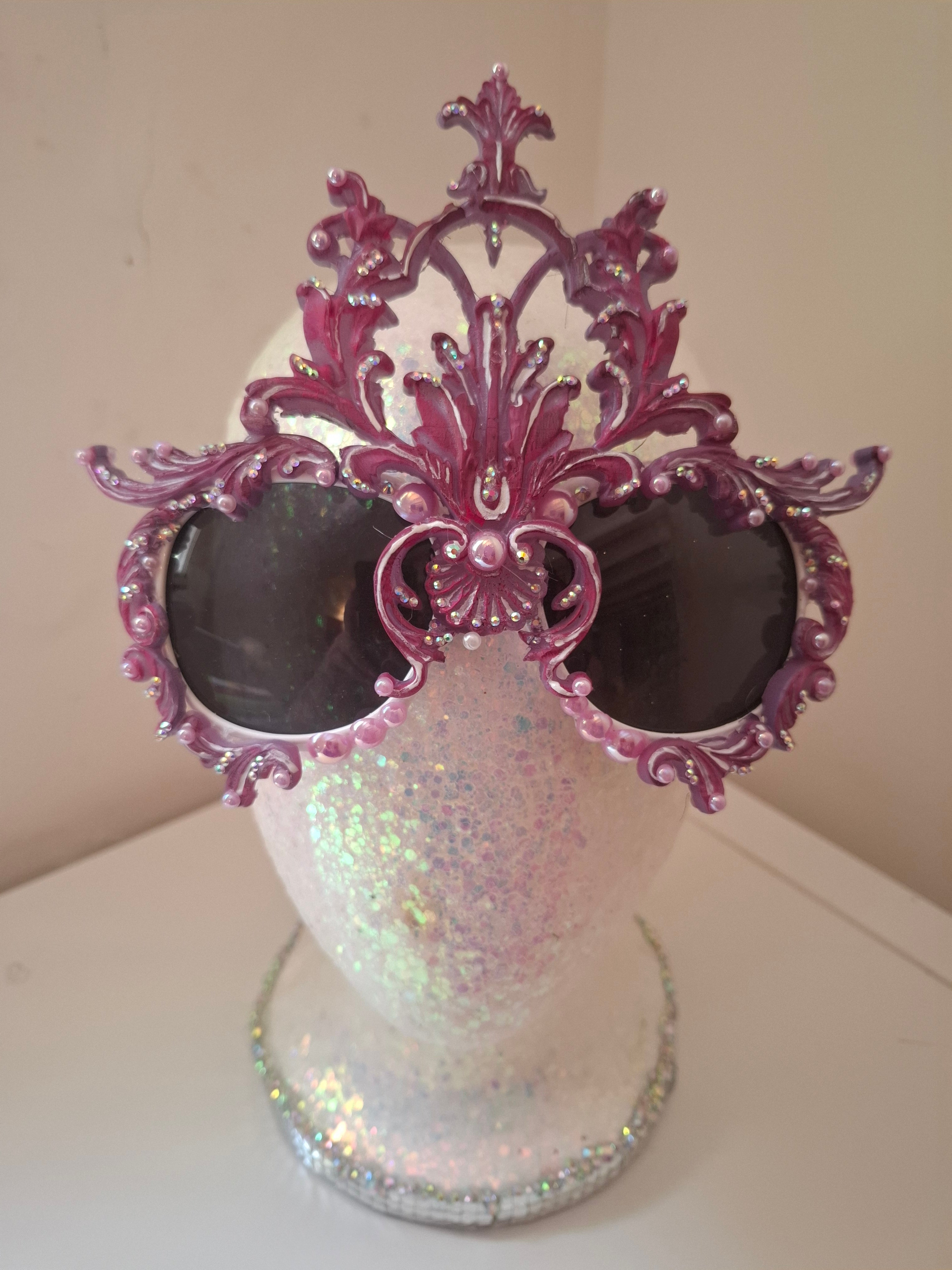 Hand-sculpted sunglasses in iridescent rose-to-lavender scrollwork with crystals. 