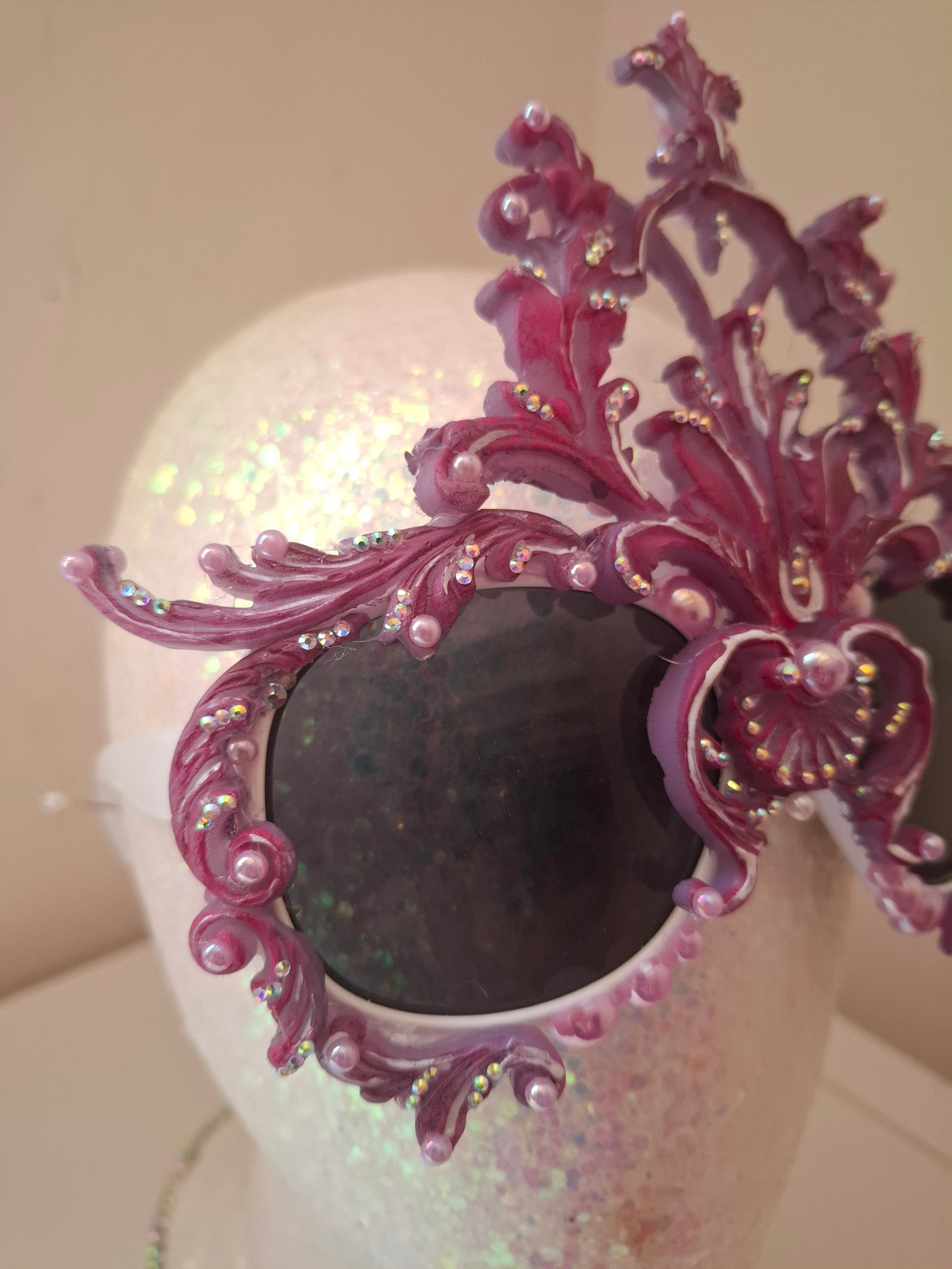 Hand-sculpted sunglasses in iridescent rose-to-lavender scrollwork with crystals. 
