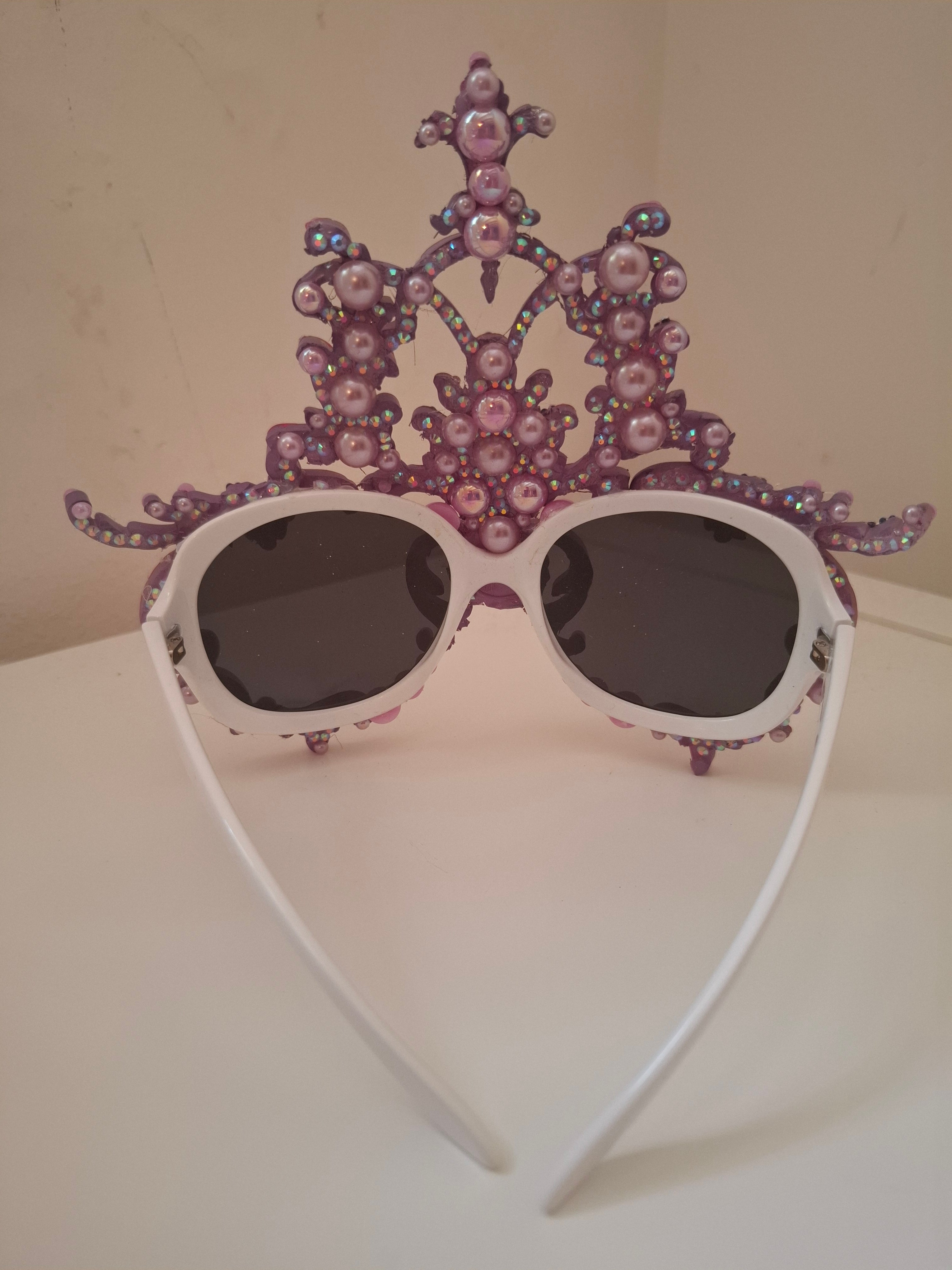 Hand-sculpted sunglasses in iridescent rose-to-lavender scrollwork with crystals. 
