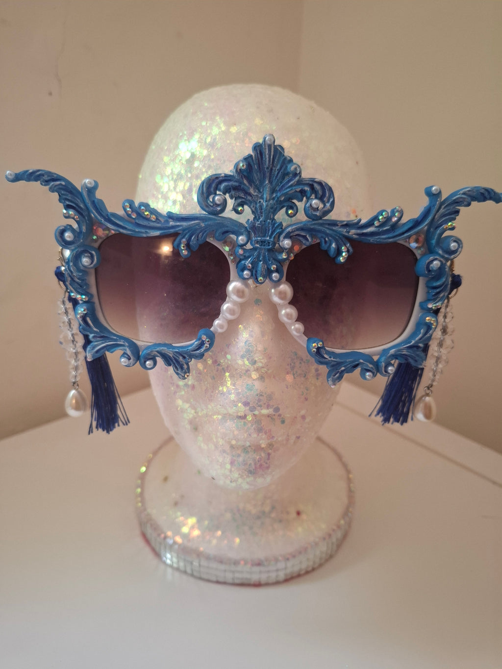  Hand-sculpted sunglasses in cobalt blue scrollwork with cascading pearl drops.