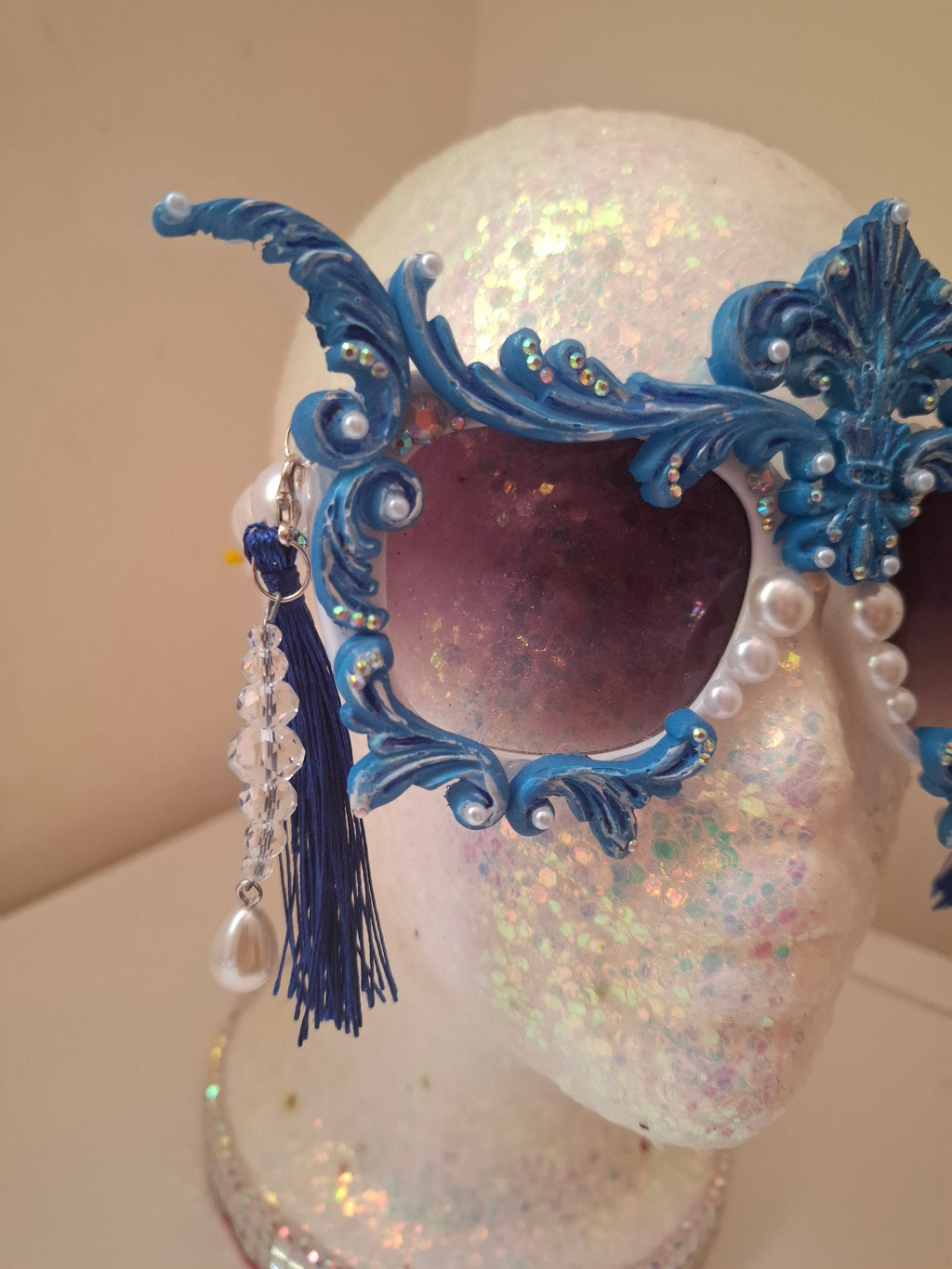  Hand-sculpted sunglasses in cobalt blue scrollwork with cascading pearl drops.