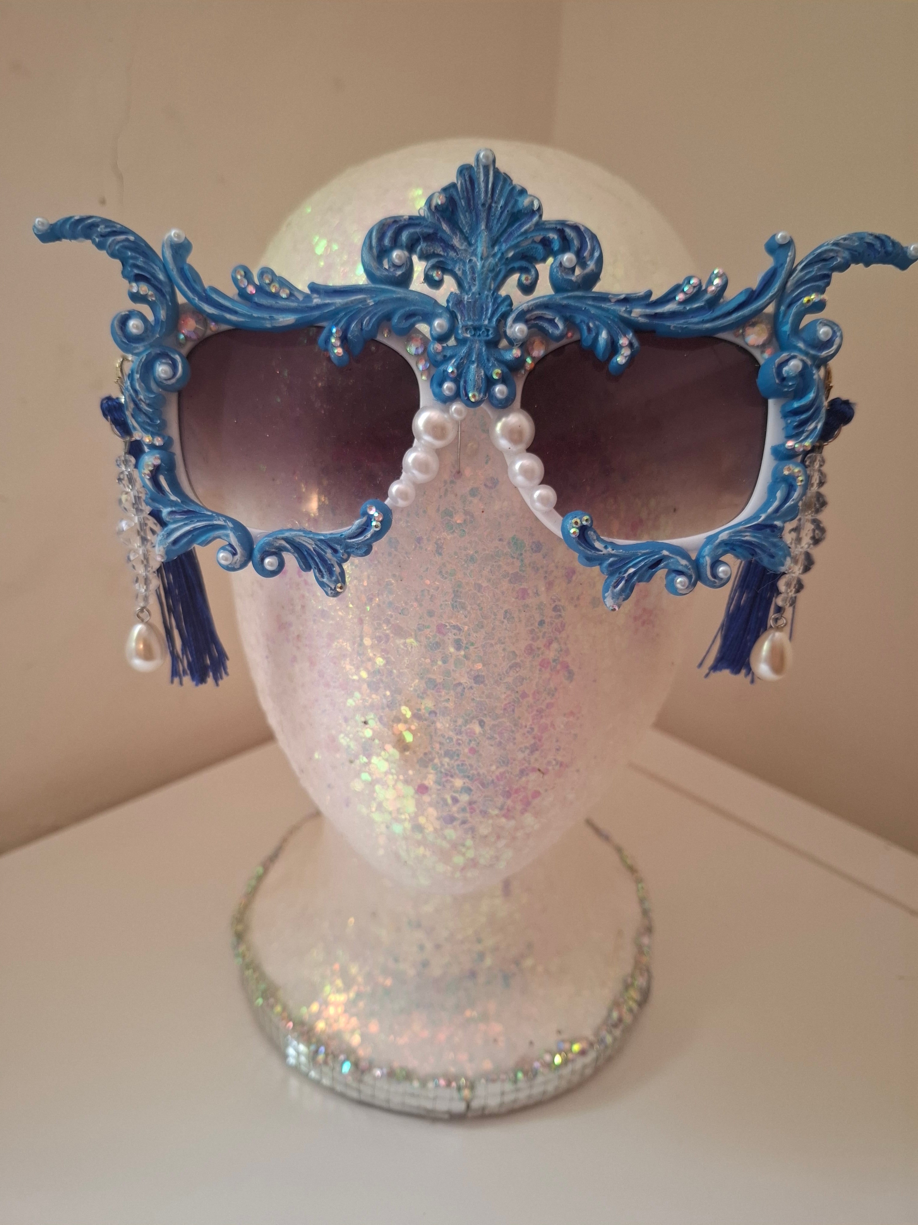  Hand-sculpted sunglasses in cobalt blue scrollwork with cascading pearl drops.