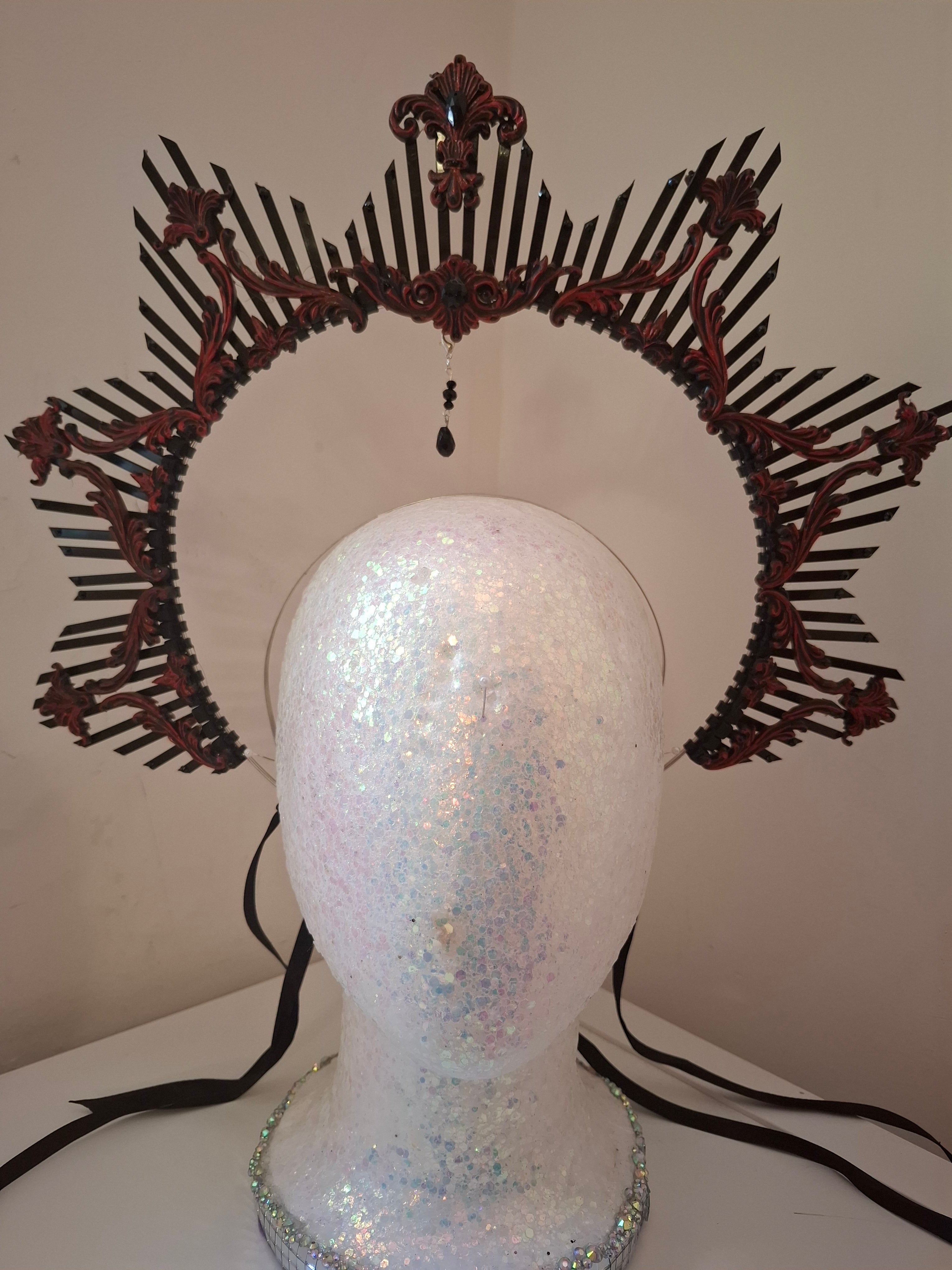 Hand-sculpted crown headpiece in crimson scrollwork, matching the Ethel sunglasses
