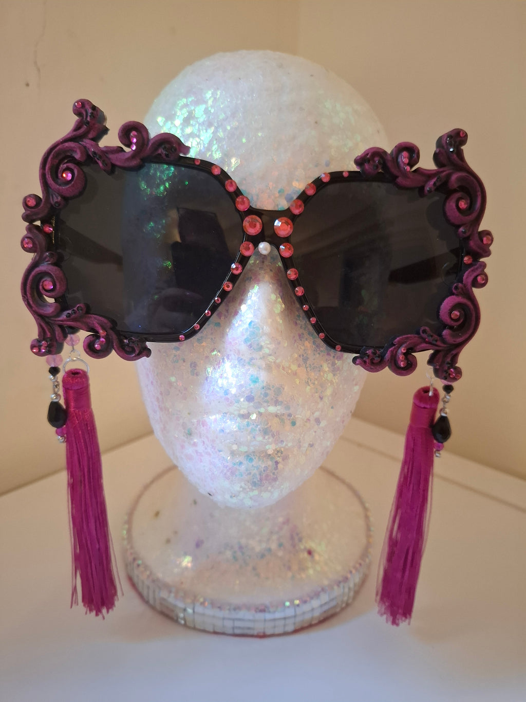 Hand-sculpted sunglasses in hot pink scrollwork