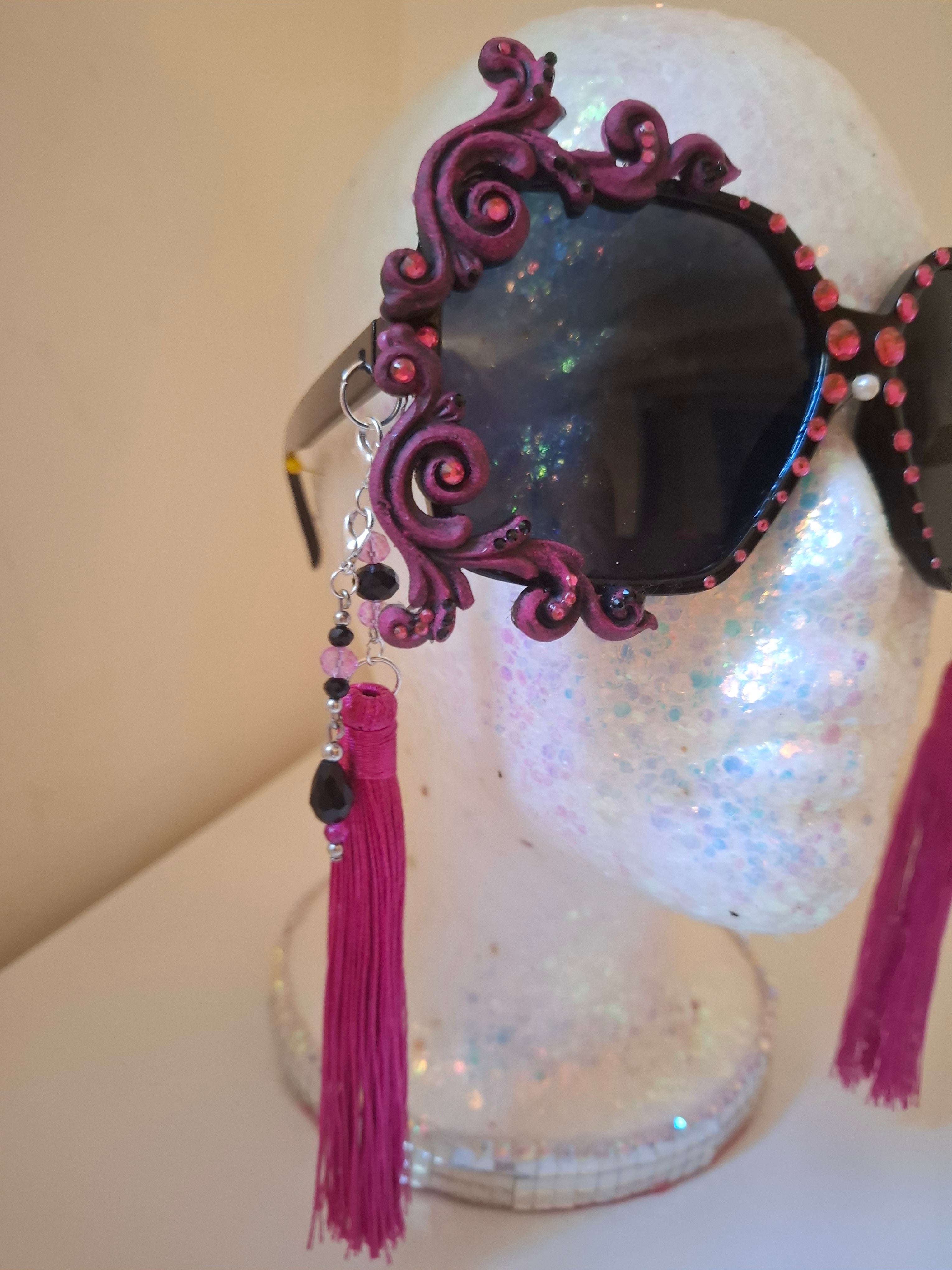 Hand-sculpted sunglasses in hot pink scrollwork