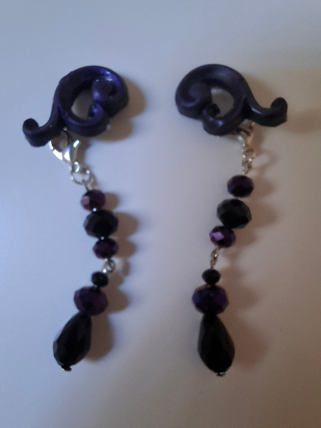 Hand-sculpted resin earrings with beading and tassels, matching the Eleanor sunglasses.